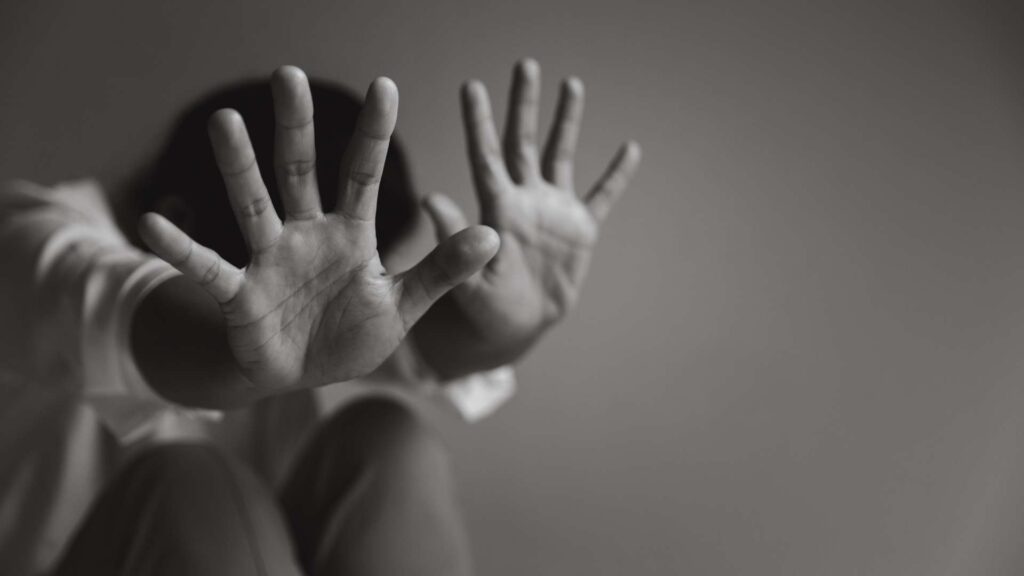 Woman Protecting Herself