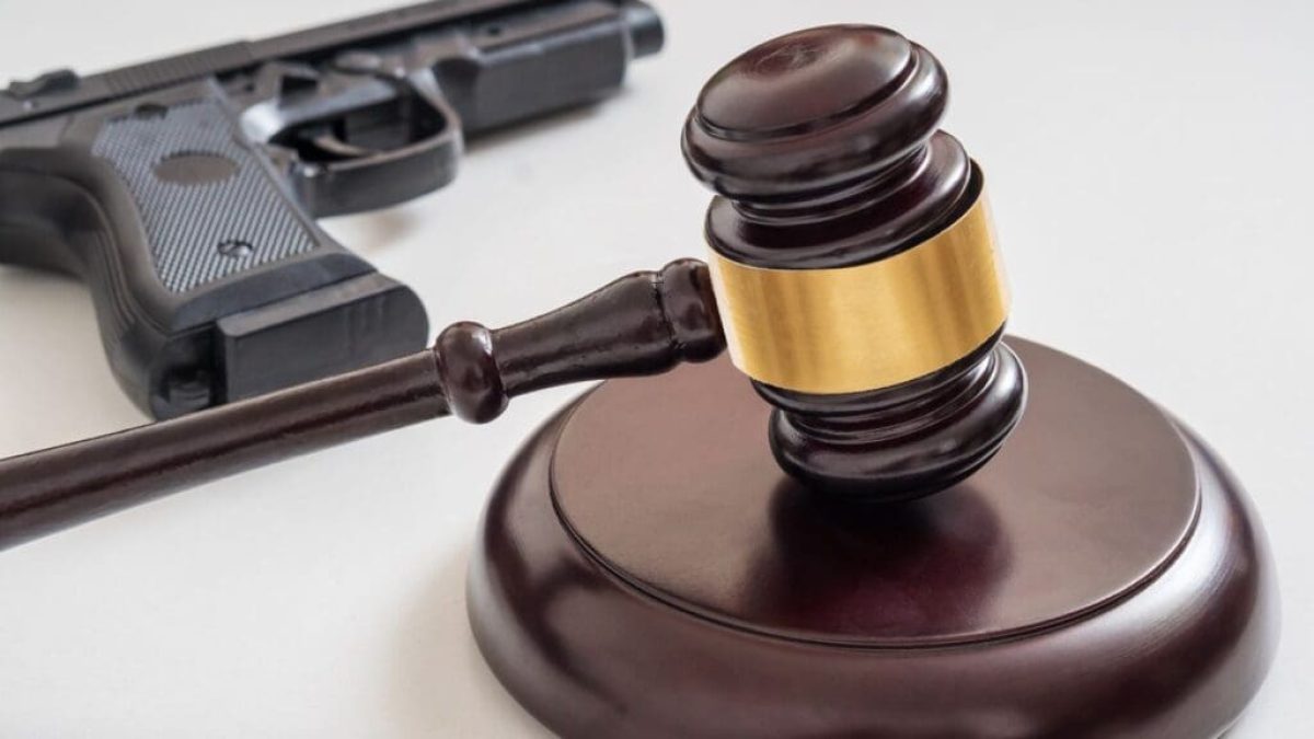 Gavel and Gun Representing Legal Justice